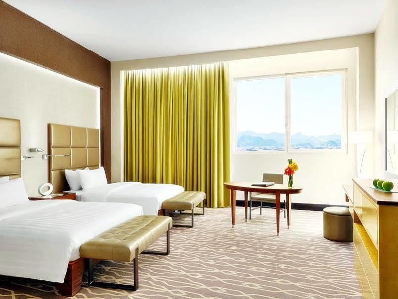 Millennium Hail Hotel Extérieur photo A guest room at the MGM Grand