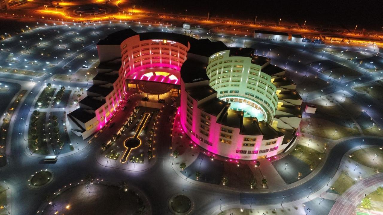 Millennium Hail Hotel Extérieur photo Aerial view of the complex